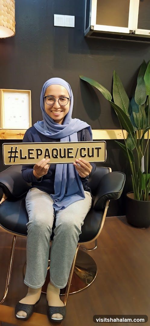 Woman holding a sign
