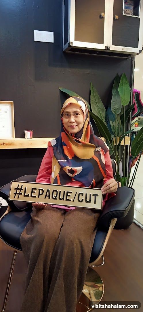 Woman holding a sign