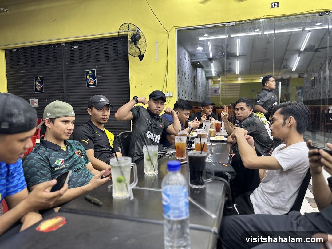 Group of men eating at a restaurant