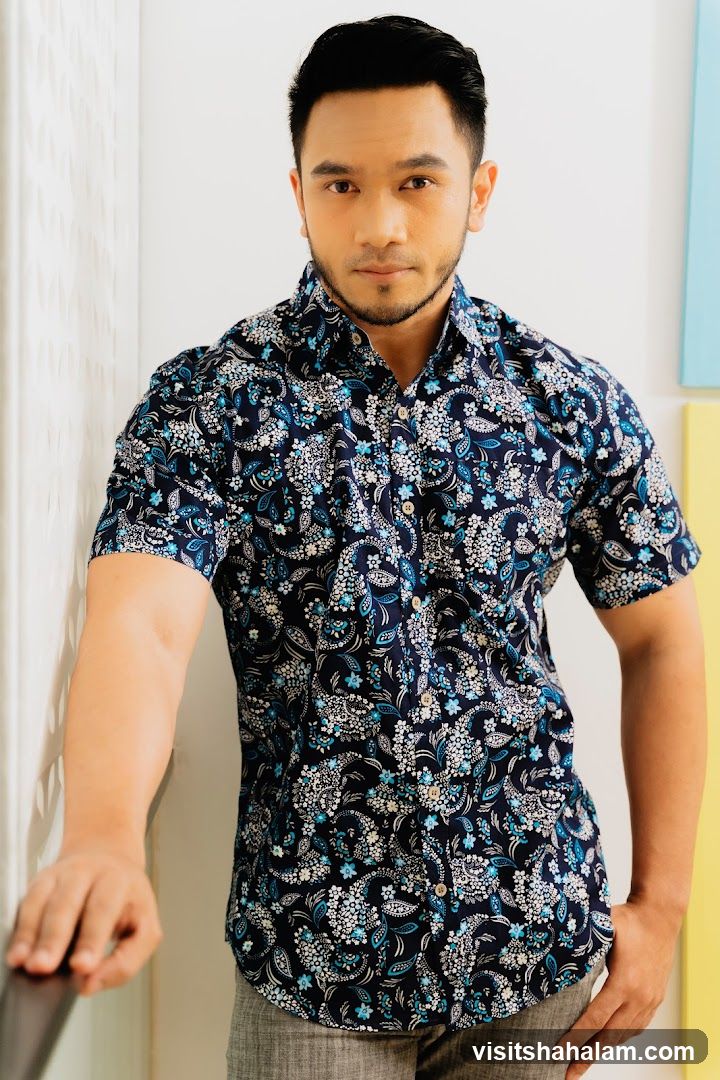 Man in patterned shirt