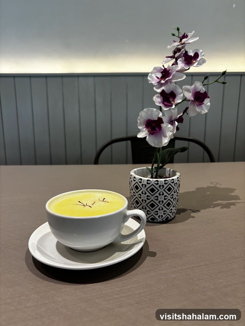 Golden Latte with Saffron and Orchid Decoration