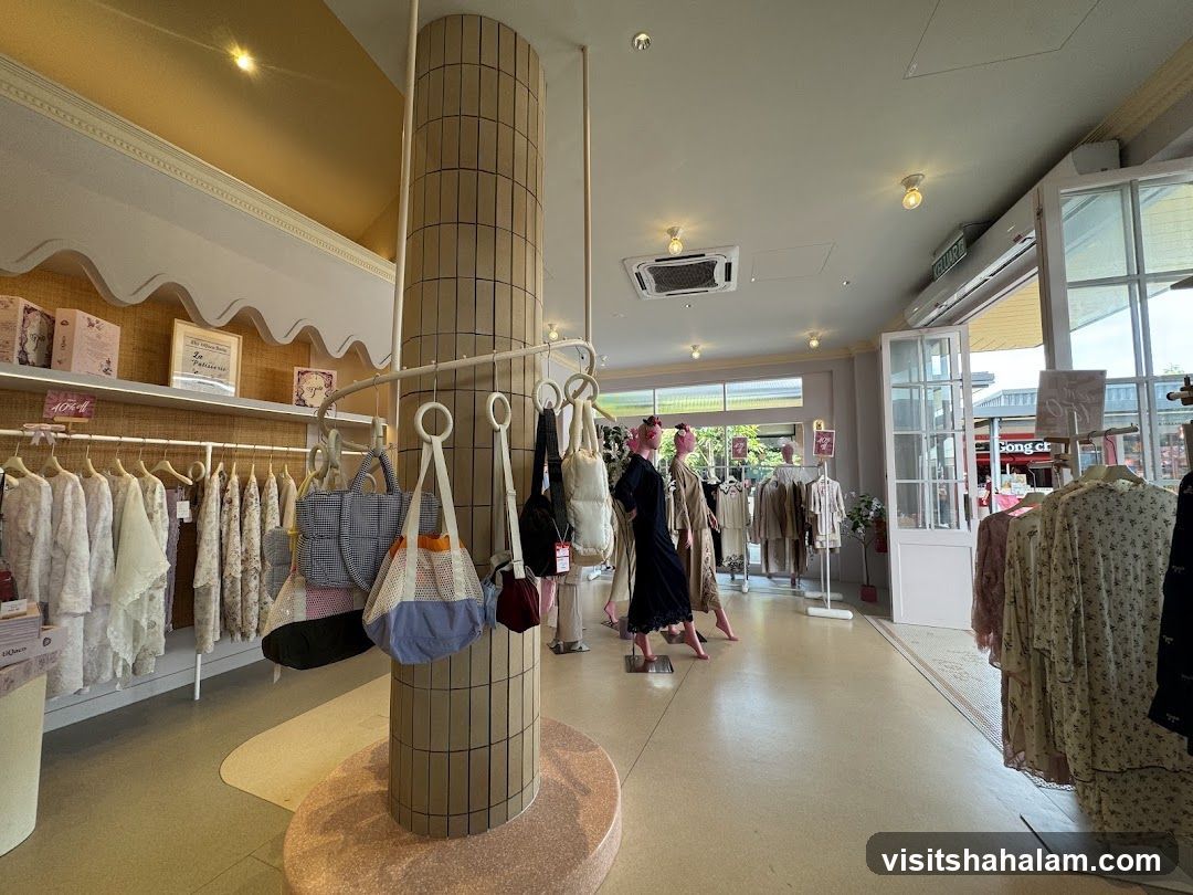 Clothing store interior with mannequins and apparel