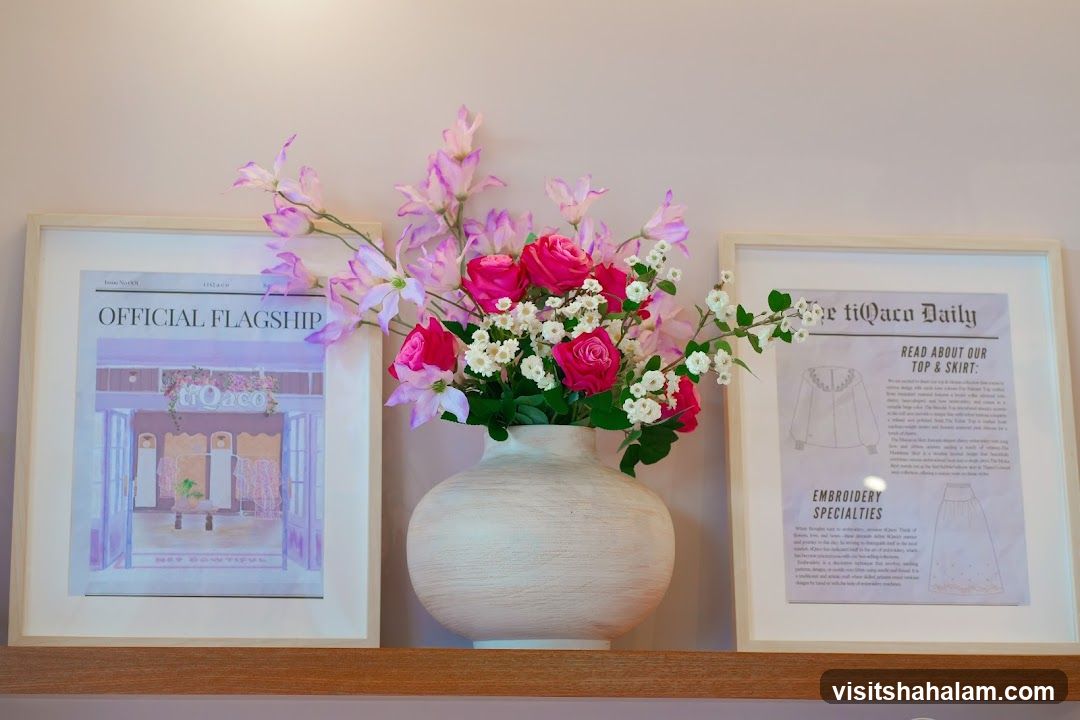 Floral Arrangement with Framed Advertisements
