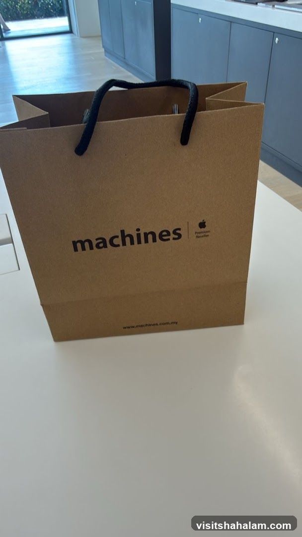 Brown paper shopping bag with Apple logo