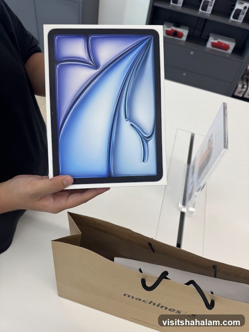 Person holding a tablet box