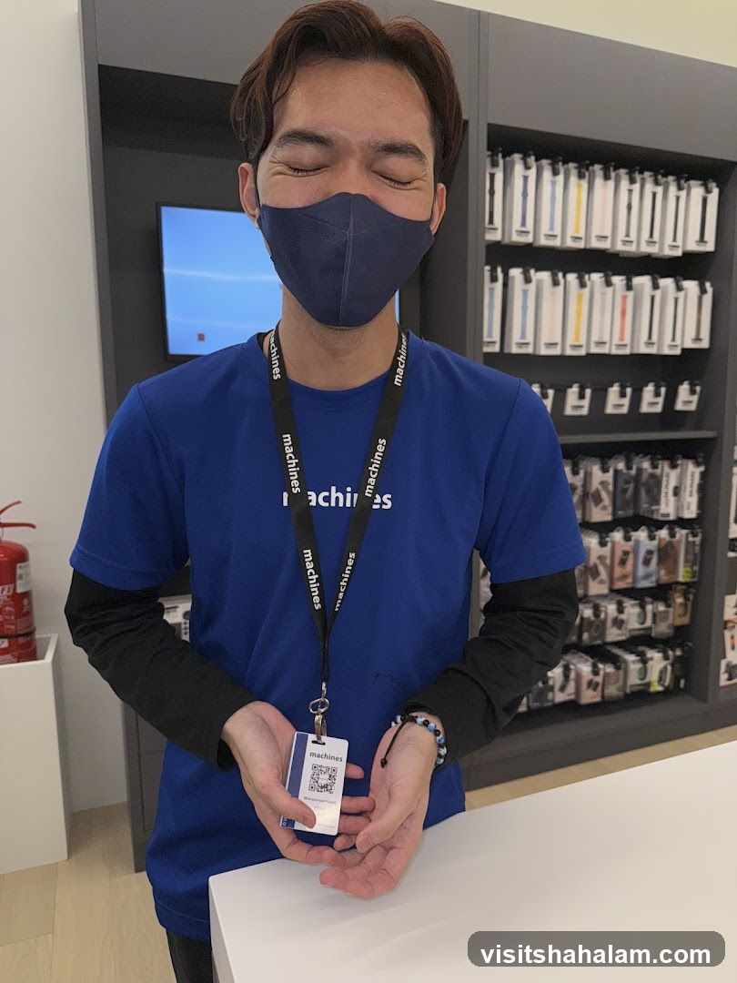 Employee holding a QR code card