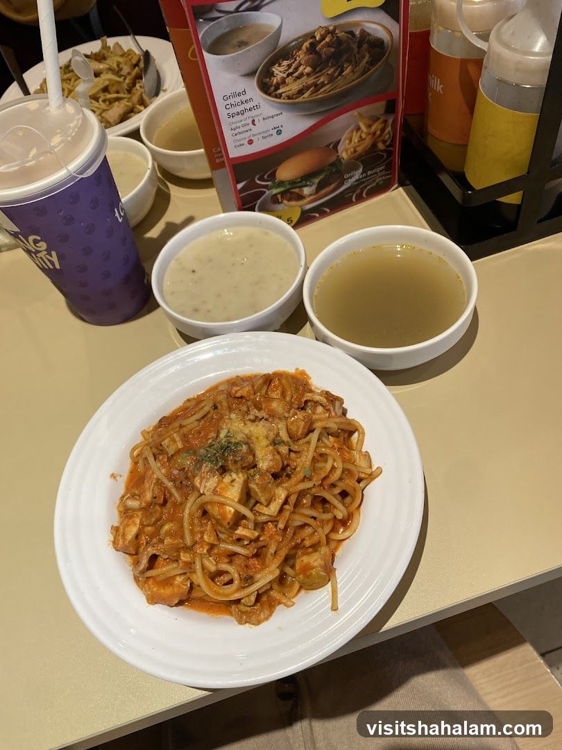 Spaghetti Meal with Soup and Drink