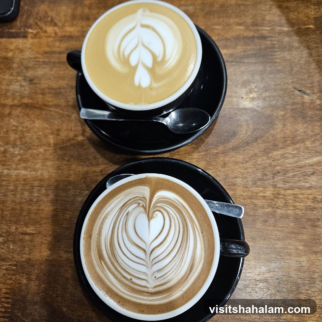 Two coffees with latte art