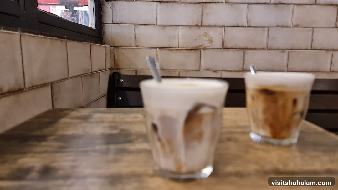 Two iced coffees on a table