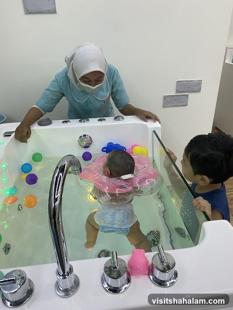 Baby enjoying a hydrotherapy session