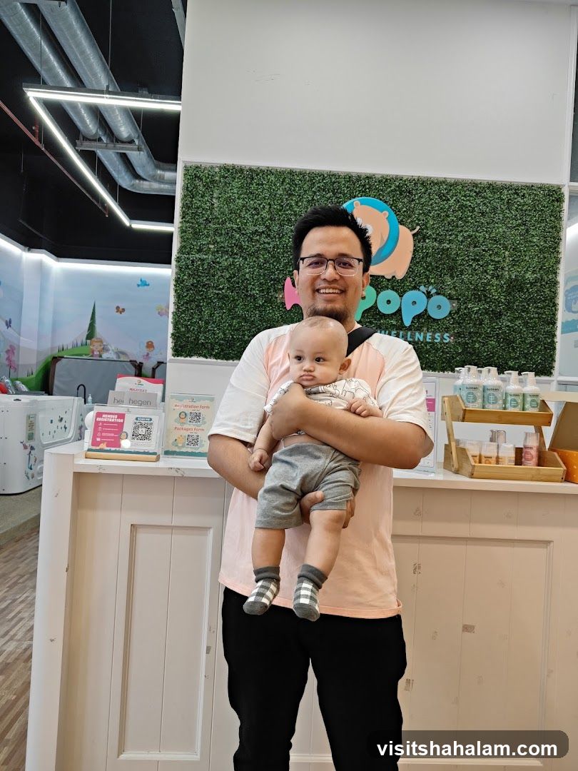 Man Holding Baby