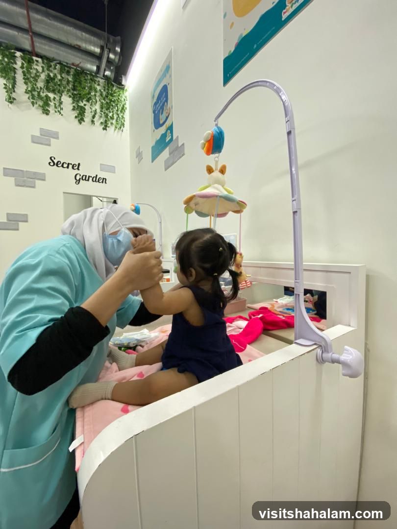 Childcare Provider Interacting with Baby