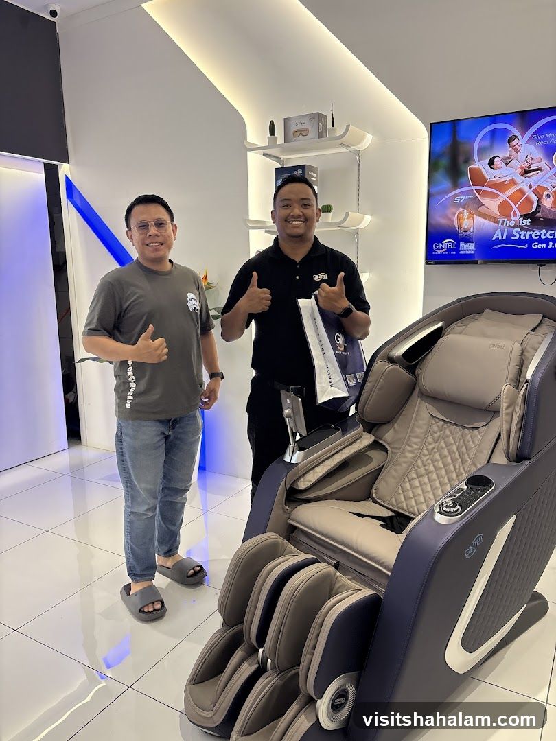 Two men with a massage chair