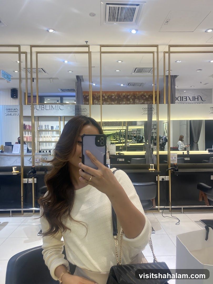 Woman taking a selfie in a salon