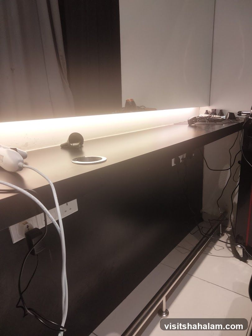 Countertop with electrical outlets and cables