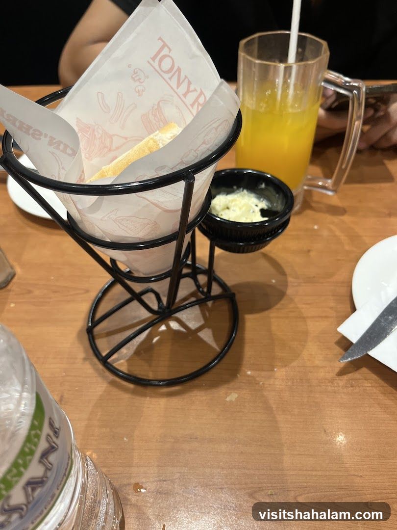 Bread basket and orange juice