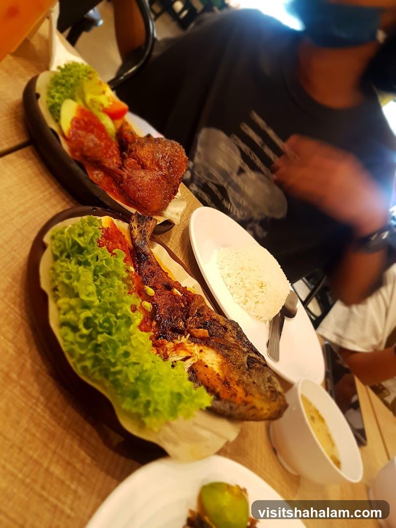 Grilled Fish and Fried Chicken Meal