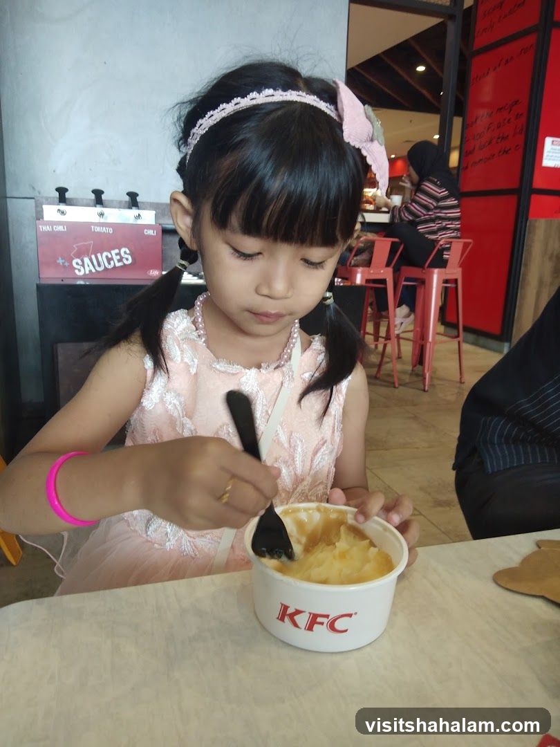 Girl Eating Mashed Potatoes
