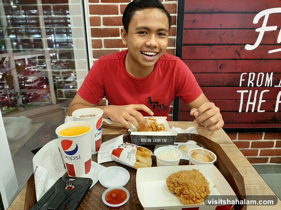 Man Eating Fried Chicken