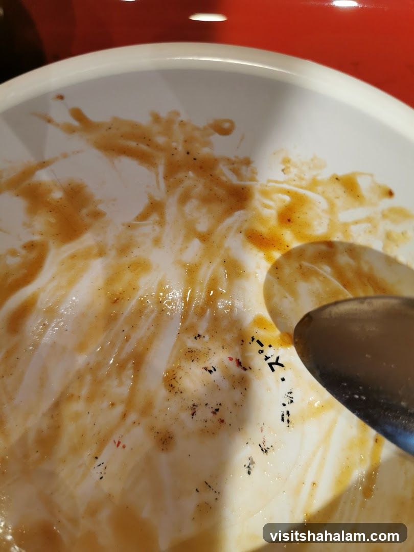 Dirty Bowl with Spoon
