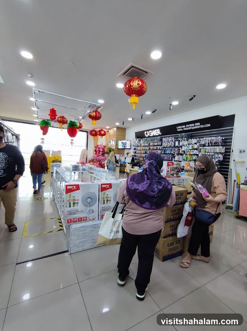 Store Interior with Fans and Cashier