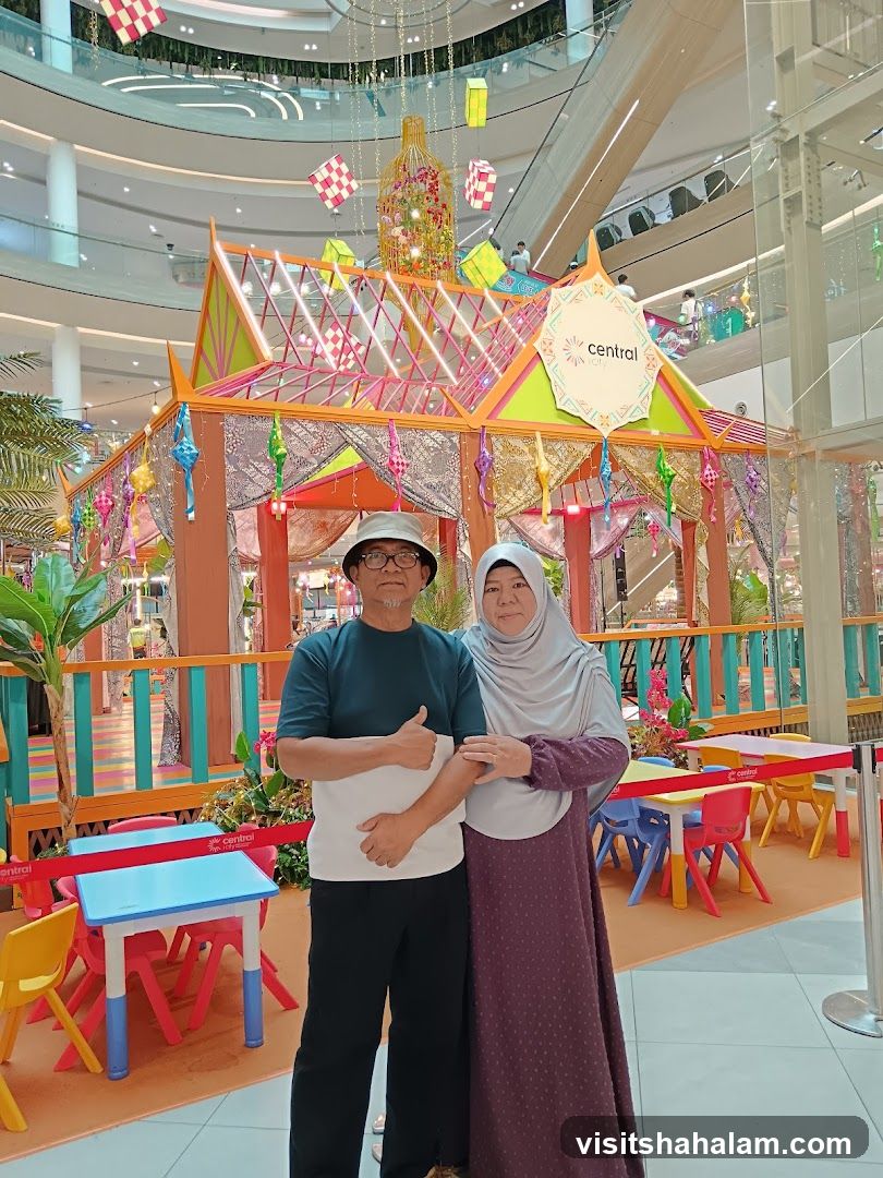Couple Posing in Festive Mall Display