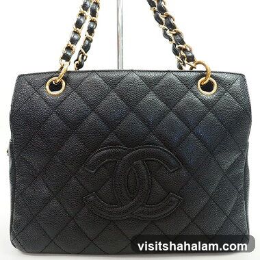Black quilted leather handbag with gold chain straps