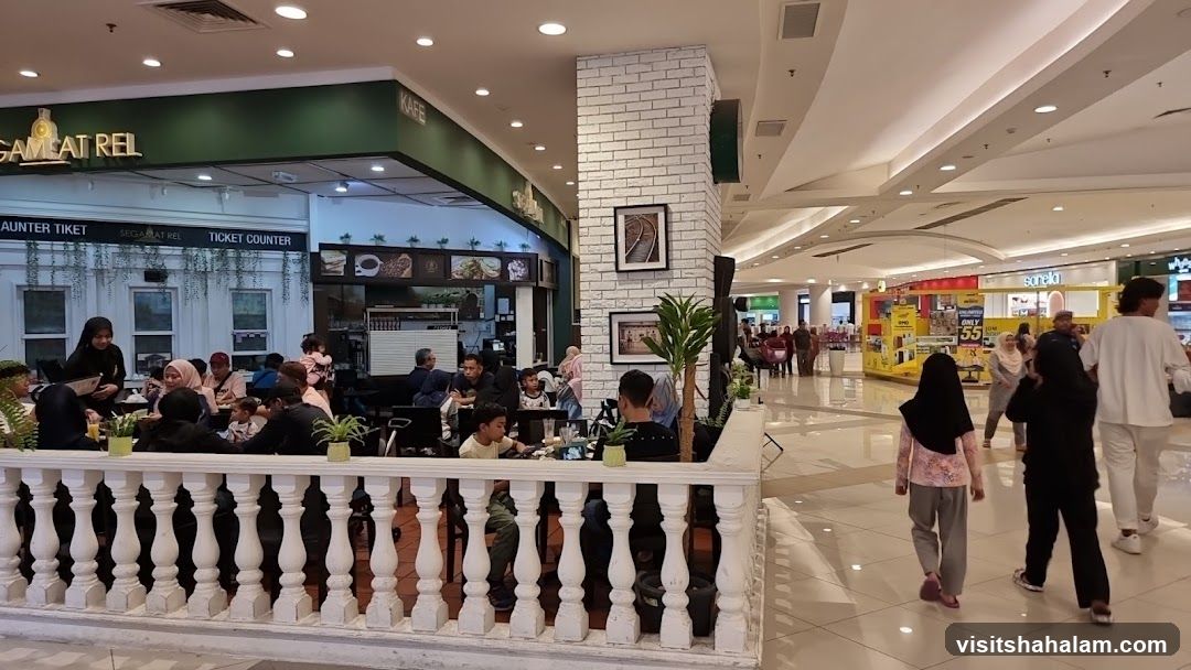 People dining at a cafe in a mall