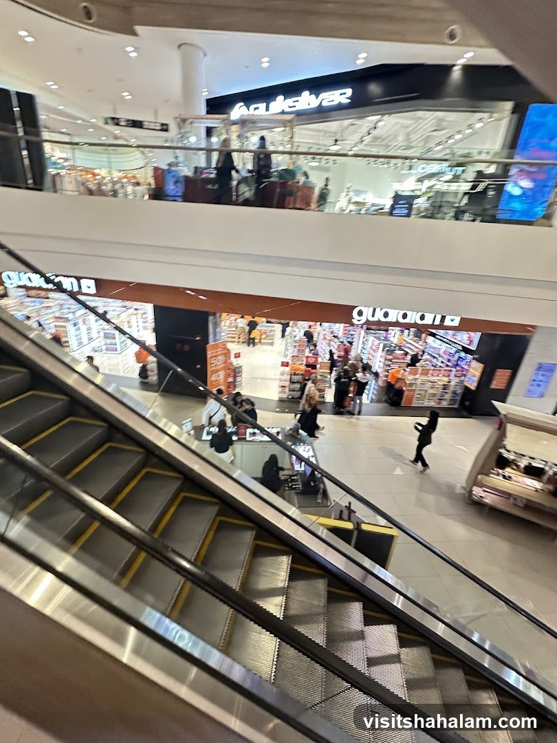 Mall Interior with Escalator and Shops