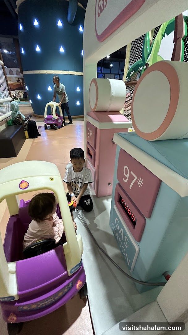 Children Playing at a Gas Station Themed Play Area