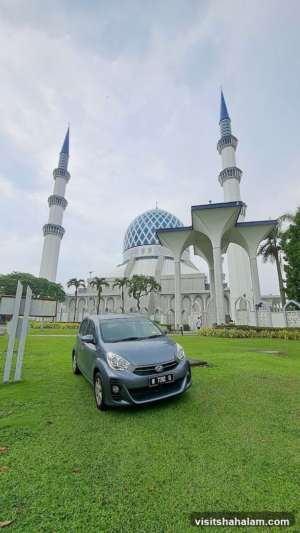 Car in front of a mosque