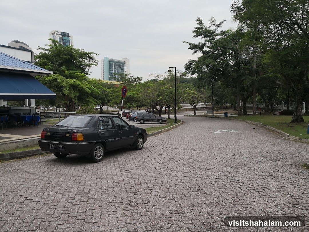 Outdoor seating area with cars and buildings