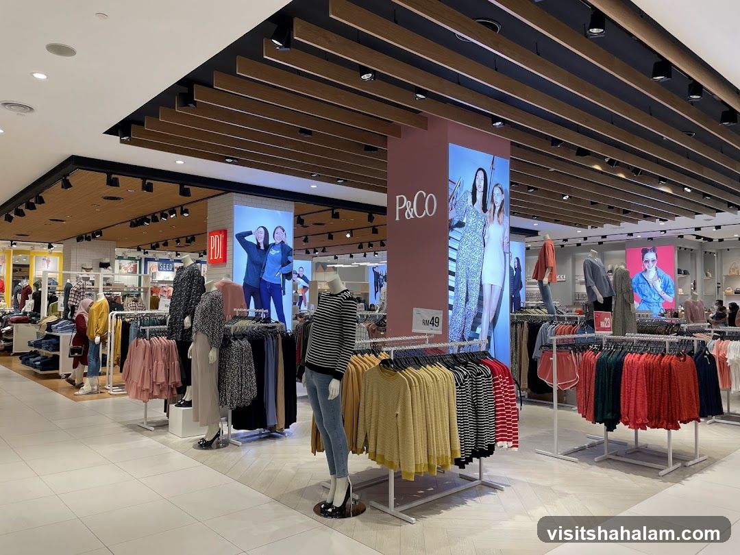 Clothing store interior with mannequins and apparel displays