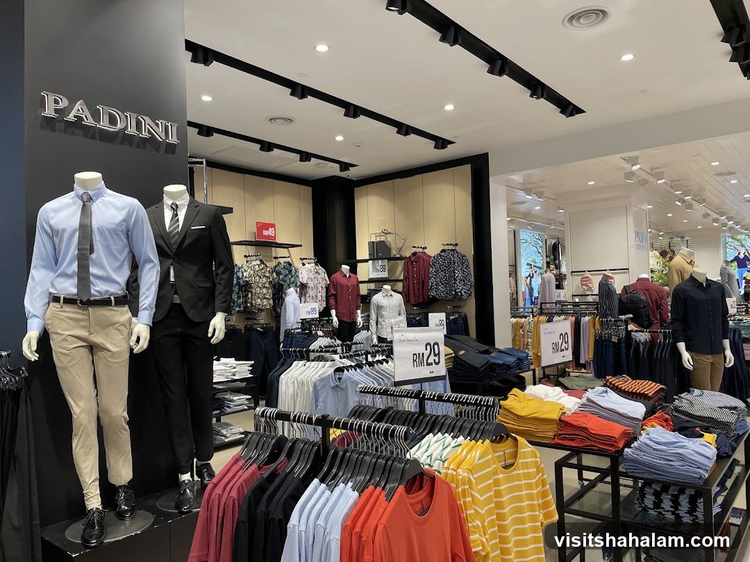 Clothing store interior with mannequins and apparel