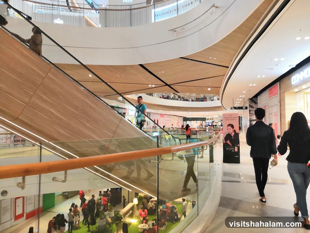 Mall Interior with Escalators and Shops
