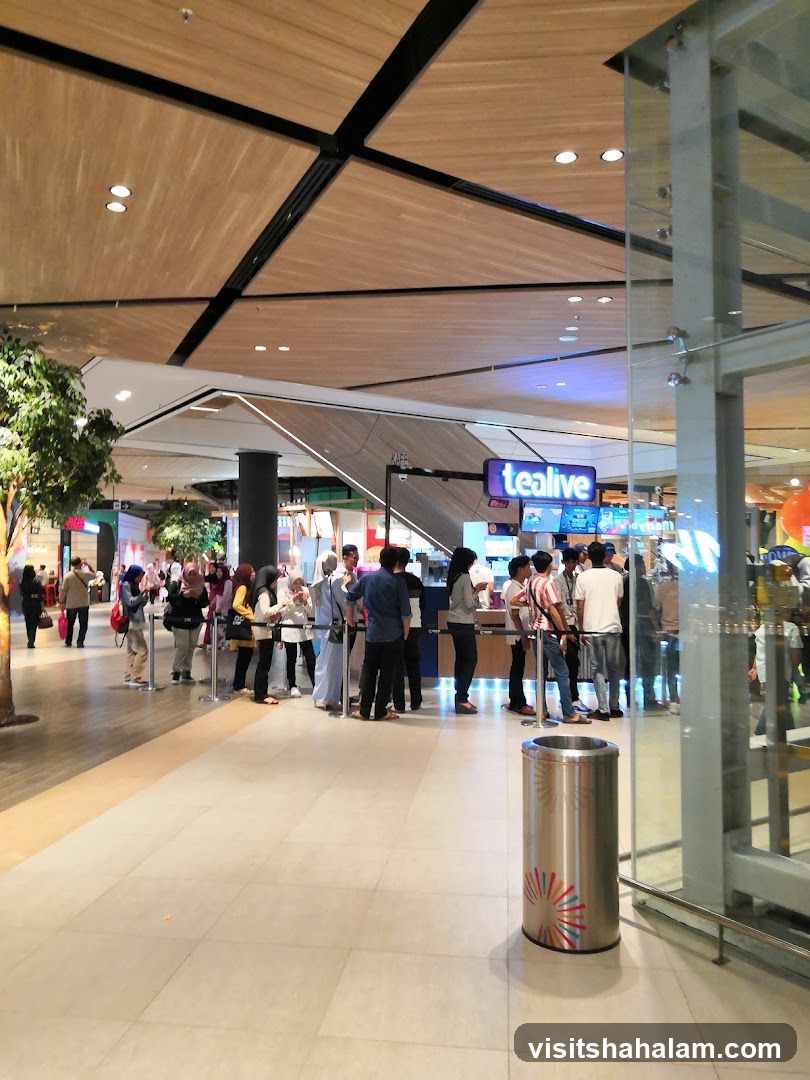 People queuing at a food stall