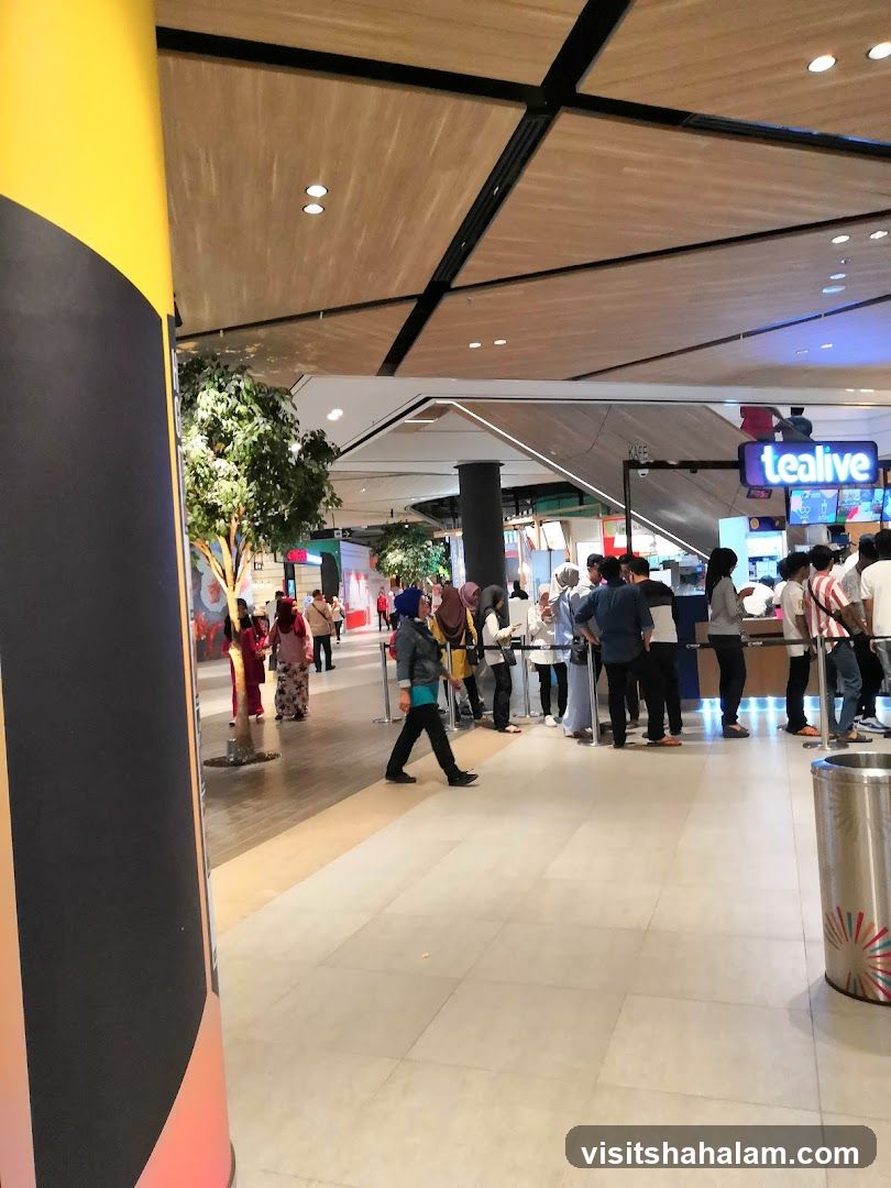 People queuing at a food stall