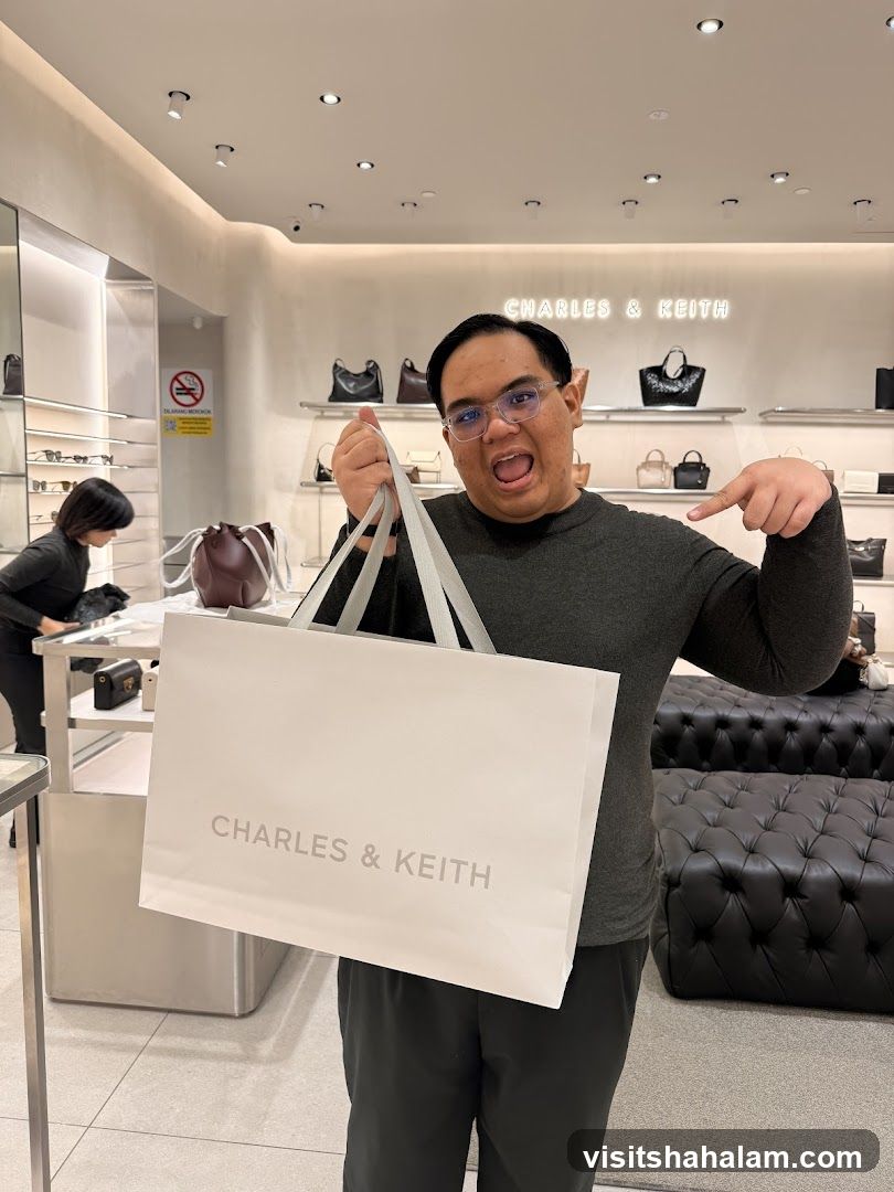 Man holding a shopping bag in a store