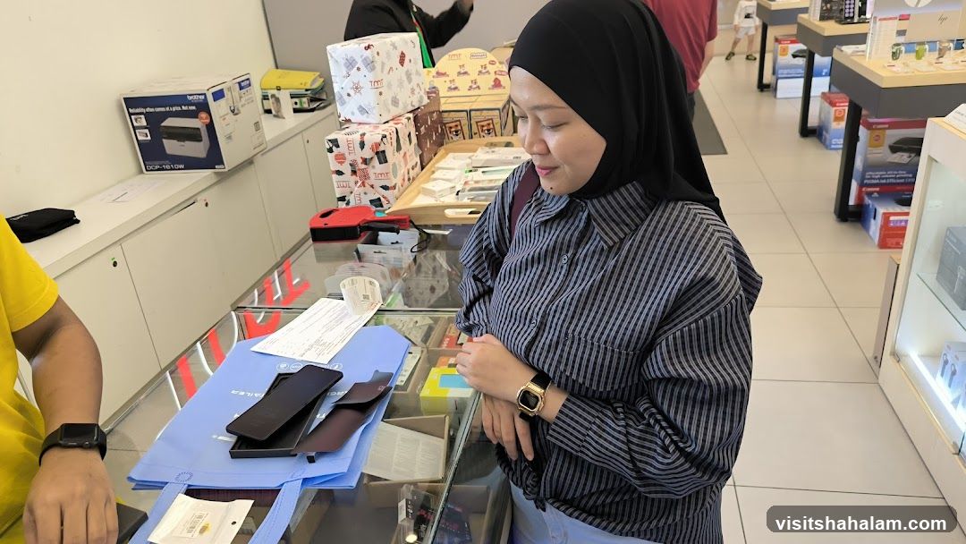 Customers browsing electronics store