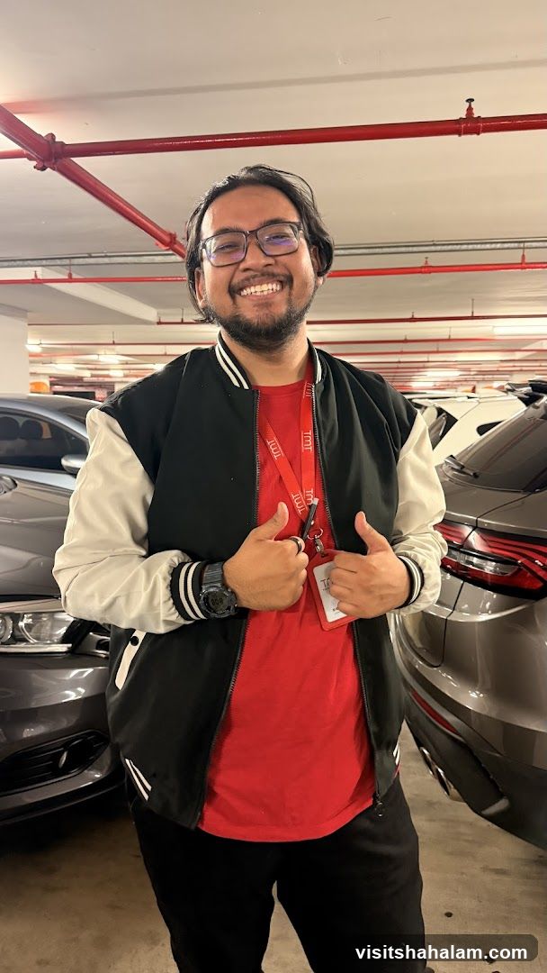 Man in bomber jacket giving thumbs up