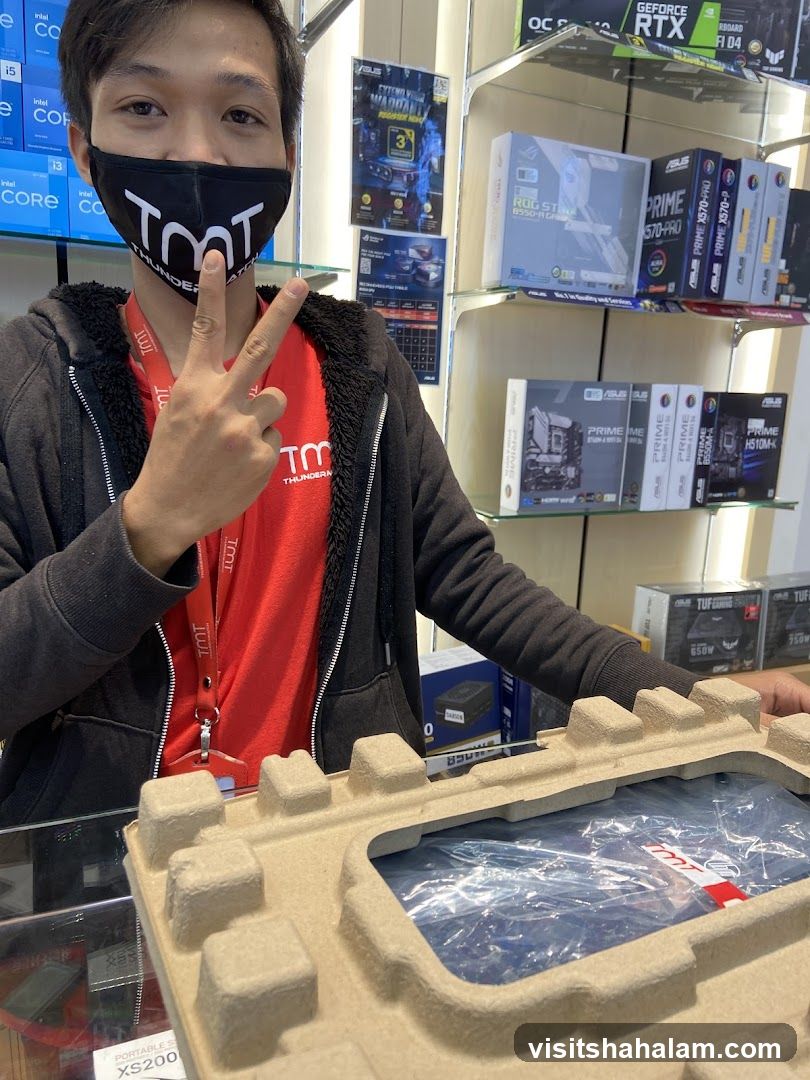Man in TMT Mask and Red Shirt