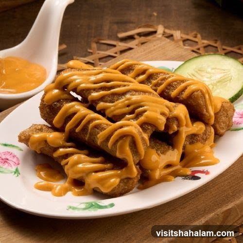 Fried Fish Sticks with Cheese Sauce