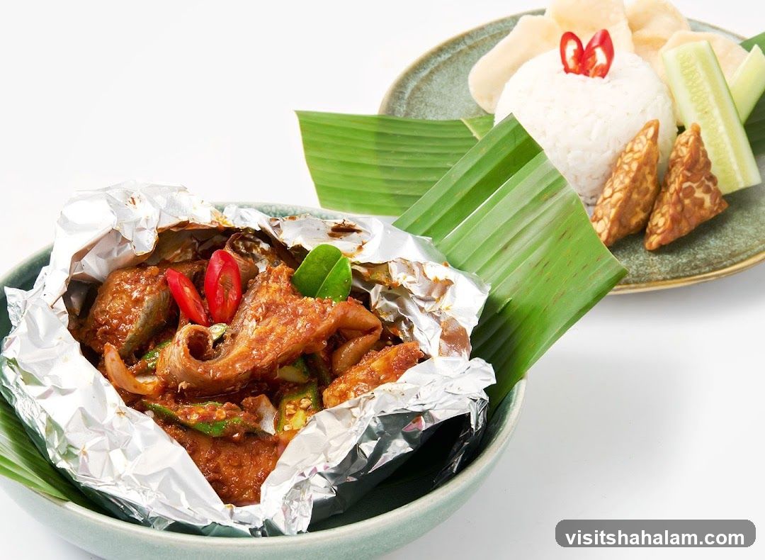 Foil-wrapped dish with rice and tempeh