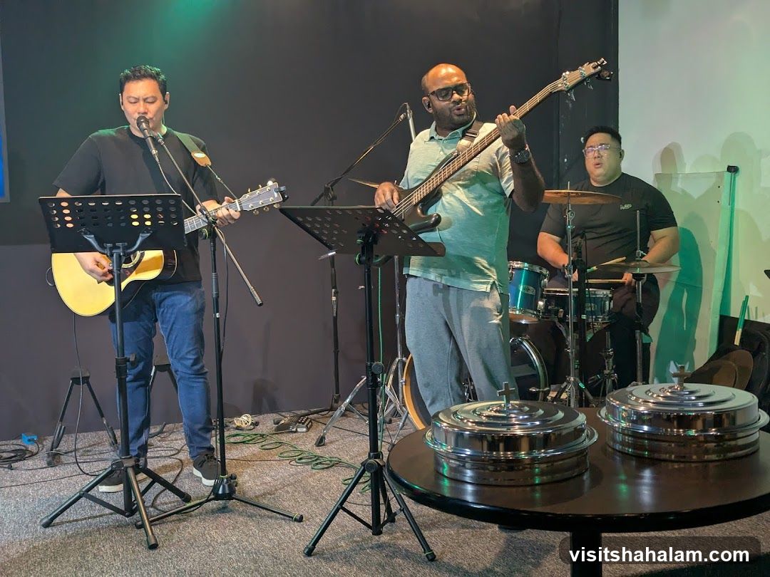Band performing with communion trays