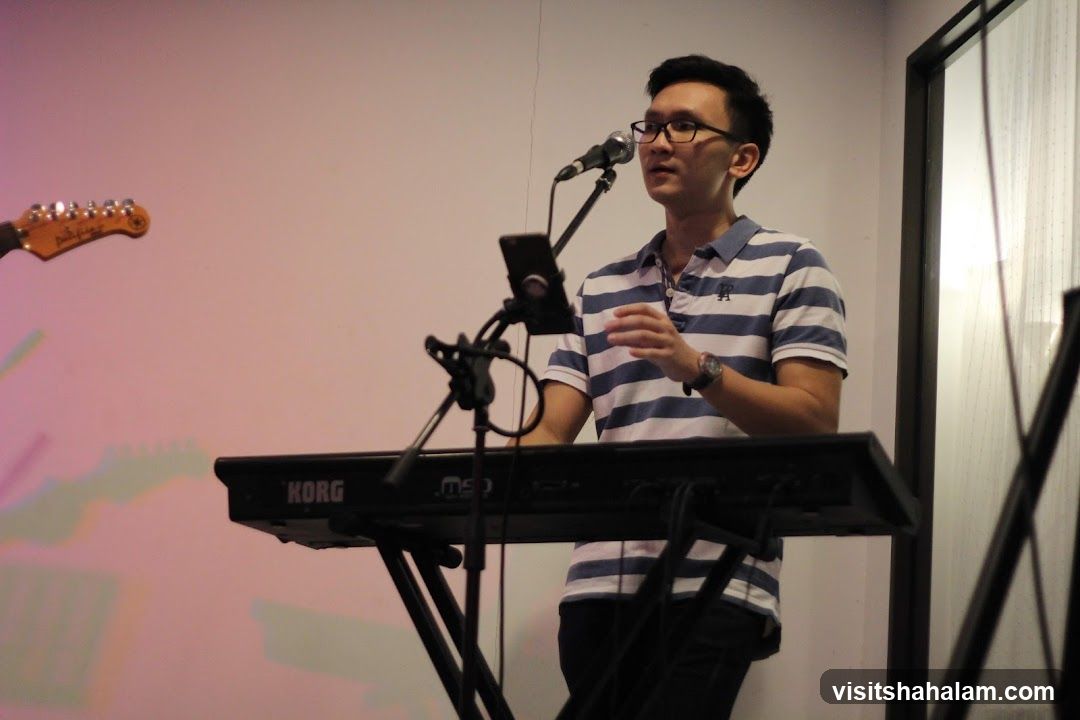 Man playing keyboard and singing