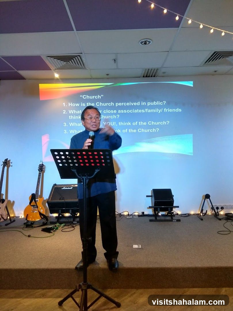 Man speaking at a podium
