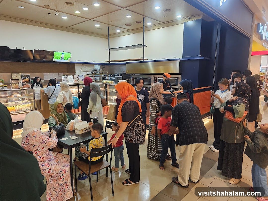 People queuing at a bakery