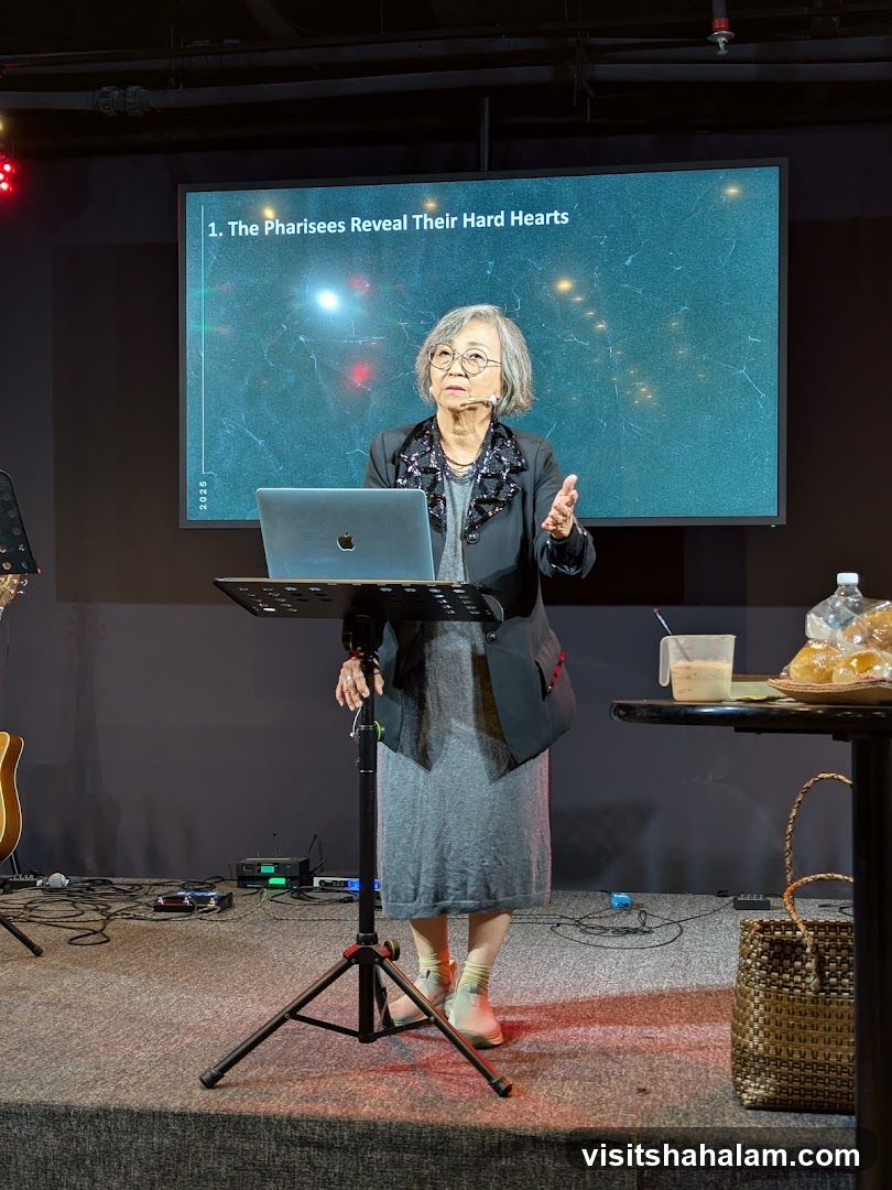 Woman Presenting on Stage