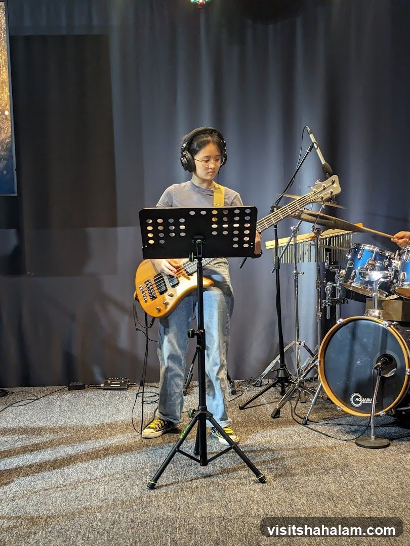 Musician playing bass guitar