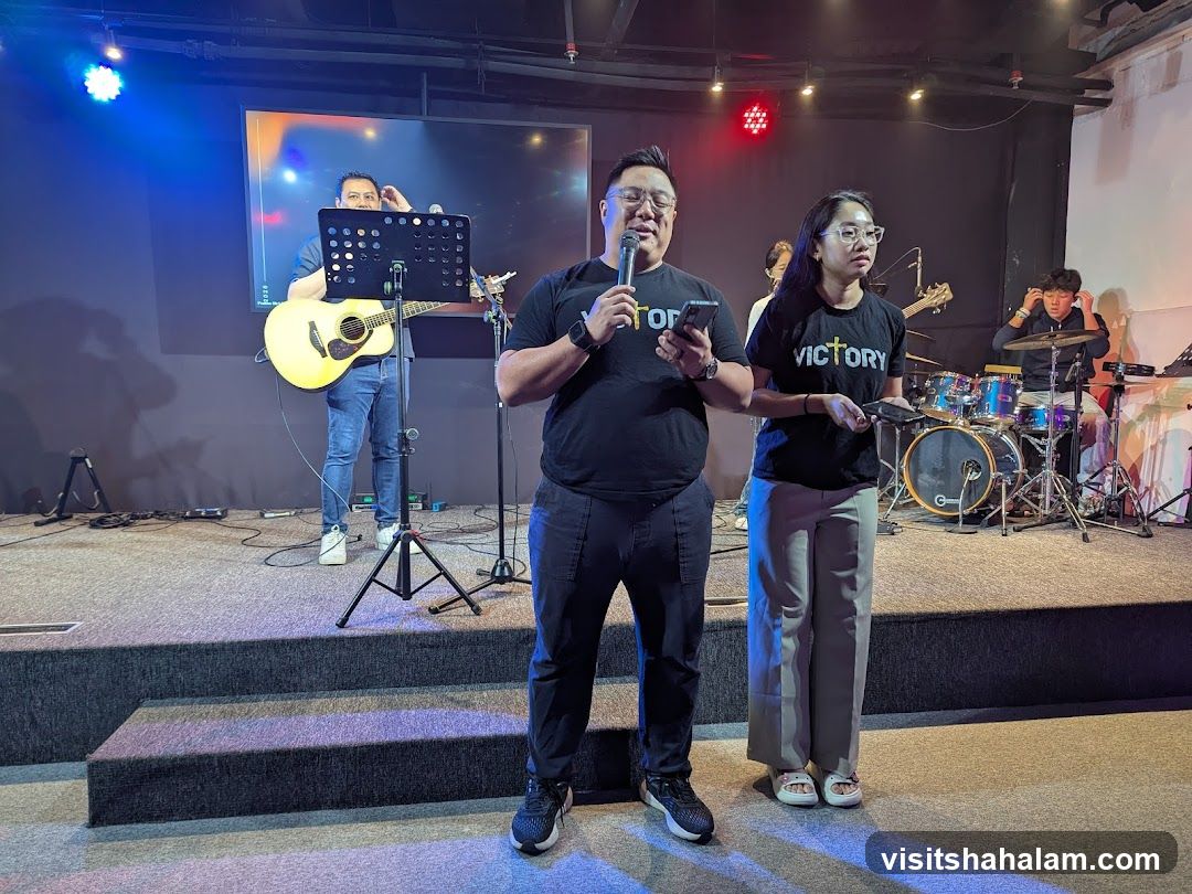 People on stage with musical instruments
